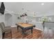 Upstairs game room features a pool table and hardwood floors at 8162 Valhalla Ter, Reunion, FL 34747