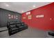 Home theater with reclining seats and large screen at 8162 Valhalla Ter, Reunion, FL 34747
