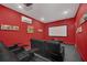 Home theater with reclining seats and large screen at 8162 Valhalla Ter, Reunion, FL 34747