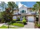 Two-story house with stone accents at 8162 Valhalla Ter, Reunion, FL 34747