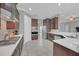 Spacious kitchen with ample counter space and dark cabinets at 8162 Valhalla Ter, Reunion, FL 34747