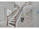 Elegant staircase in a spacious foyer at 8162 Valhalla Ter, Reunion, FL 34747