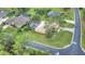 House with pool and driveway seen from above at 26 Lake Diamond Ave, Ocala, FL 34472