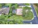 Aerial view of house and neighborhood at 26 Lake Diamond Ave, Ocala, FL 34472