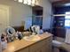 Bathroom with single sink and shower/tub combo at 26 Lake Diamond Ave, Ocala, FL 34472
