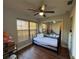 Bedroom with daybed and mirrored closet doors at 26 Lake Diamond Ave, Ocala, FL 34472
