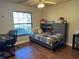 Bedroom with built-in shelving and window at 26 Lake Diamond Ave, Ocala, FL 34472