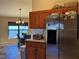Kitchen features stainless steel appliances and breakfast nook at 26 Lake Diamond Ave, Ocala, FL 34472