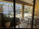 View of the patio and pool from inside the house at 26 Lake Diamond Ave, Ocala, FL 34472