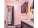 Clean bathroom with marble shower and vanity at 103 Las Flores, Winter Haven, FL 33884