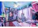 Bedroom with ample closet space, a desk, and a ceiling fan at 103 Las Flores, Winter Haven, FL 33884