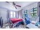 Bright bedroom with a bed, desk and window at 103 Las Flores, Winter Haven, FL 33884
