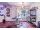Bright dining area with table and chairs, hardwood floors, and view to backyard at 103 Las Flores, Winter Haven, FL 33884