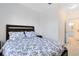 Bedroom with a queen bed and an ensuite bathroom at 1311 E 10Th St, Apopka, FL 32703
