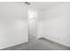Bedroom featuring carpeted floors, white walls and a closet at 1311 E 10Th St, Apopka, FL 32703