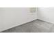 Bedroom featuring a window and carpeted floors at 1311 E 10Th St, Apopka, FL 32703