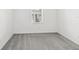 Bedroom featuring a window and carpeted floors at 1311 E 10Th St, Apopka, FL 32703