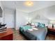 Spacious bedroom with a king-size bed and large window at 1361 Tuscan Ter # 7305, Davenport, FL 33896