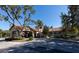 Tuscana Grand's welcoming entrance with lush landscaping at 1361 Tuscan Ter # 7305, Davenport, FL 33896