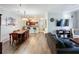 Open concept dining room with a large table and kitchen views at 1361 Tuscan Ter # 7305, Davenport, FL 33896