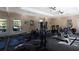 Well-equipped fitness center with cardio and weight training machines at 1361 Tuscan Ter # 7305, Davenport, FL 33896