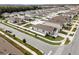 Aerial view of house and surrounding neighborhood at 1956 Egret Meadows Ave, Kissimmee, FL 34744