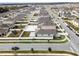 Aerial view of a neighborhood with houses and streets at 1956 Egret Meadows Ave, Kissimmee, FL 34744