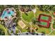 Resort-style amenities including pools, tennis courts, playground, and sand volleyball at 1956 Egret Meadows Ave, Kissimmee, FL 34744