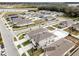 Aerial view of neighborhood with community features at 1956 Egret Meadows Ave, Kissimmee, FL 34744
