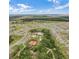Aerial view of community with tennis courts and pool at 1956 Egret Meadows Ave, Kissimmee, FL 34744