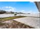 Backyard with patio and partial fence at 1956 Egret Meadows Ave, Kissimmee, FL 34744