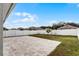 Large backyard patio and grassy area at 1956 Egret Meadows Ave, Kissimmee, FL 34744