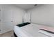 Well-lit bedroom with full-size bed and access to a bathroom at 1956 Egret Meadows Ave, Kissimmee, FL 34744
