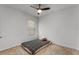 Small bedroom with twin-size bed and ceiling fan at 1956 Egret Meadows Ave, Kissimmee, FL 34744
