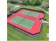 Aerial view of two well-maintained tennis courts at 1956 Egret Meadows Ave, Kissimmee, FL 34744