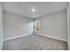 Spacious bedroom with carpet and large window at 22 Peterlee Ct, Kissimmee, FL 34758