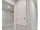 Bright hallway with access to closet and other rooms at 22 Peterlee Ct, Kissimmee, FL 34758
