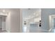 Open kitchen with island and stainless steel appliances at 22 Peterlee Ct, Kissimmee, FL 34758