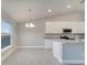 Bright kitchen with island and breakfast nook at 22 Peterlee Ct, Kissimmee, FL 34758