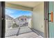 Private balcony with composite decking and neighborhood views at 2274 Centerra Loop, Kissimmee, FL 34741