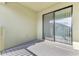 Private balcony with sliding glass doors and composite decking at 2274 Centerra Loop, Kissimmee, FL 34741