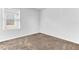 Spacious bedroom with neutral carpeting and window at 2274 Centerra Loop, Kissimmee, FL 34741