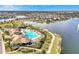Aerial view of community pool and lake at 2274 Centerra Loop, Kissimmee, FL 34741