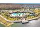Resort-style pool with lake view in community at 2274 Centerra Loop, Kissimmee, FL 34741