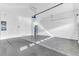 Attached garage with overhead door and storage space at 2274 Centerra Loop, Kissimmee, FL 34741