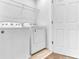 Laundry room with Whirlpool washer and dryer at 2274 Centerra Loop, Kissimmee, FL 34741