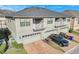 Townhome exterior with garage and driveway at 2274 Centerra Loop, Kissimmee, FL 34741
