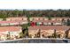 Aerial view of townhouses with a focus on one unit at 2621 Bugatti Ct, Kissimmee, FL 34746
