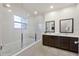 Double vanity, soaking tub, and walk-in shower at 2621 Bugatti Ct, Kissimmee, FL 34746