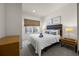 Comfortable bedroom with king-size bed and neutral decor at 2621 Bugatti Ct, Kissimmee, FL 34746
